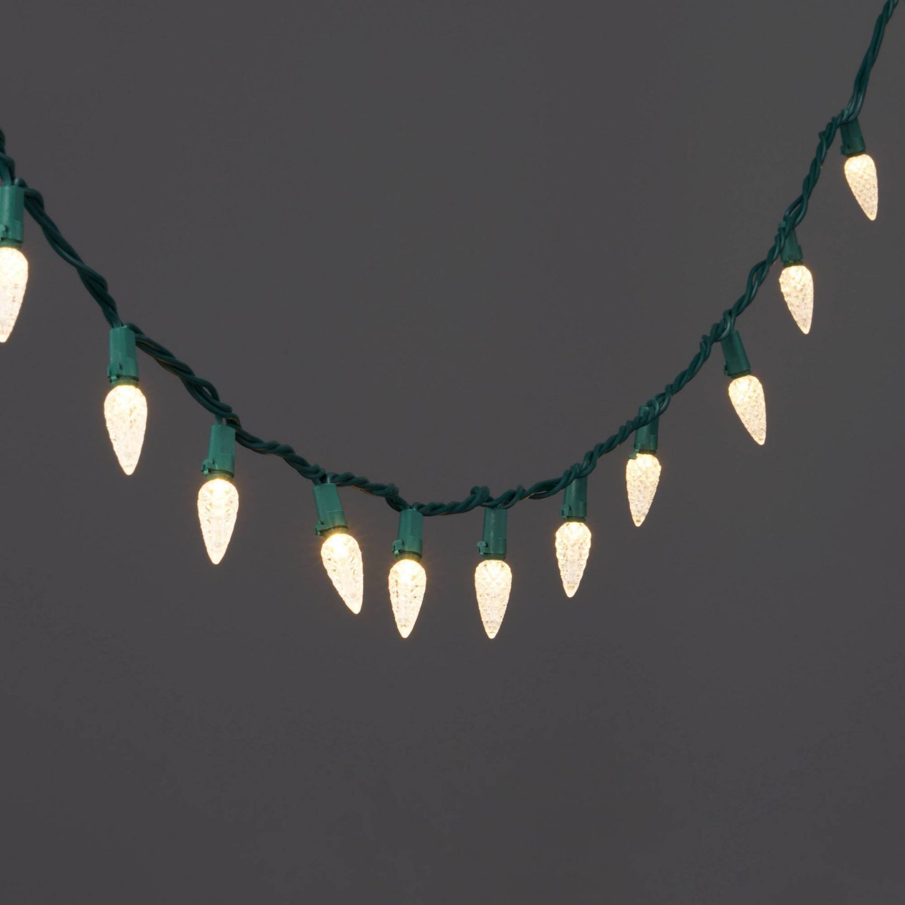 60ct LED C6 Faceted Christmas String Lights Warm White with Green Wire - Wondershop